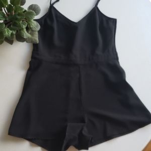 Black romper with peekaboo back